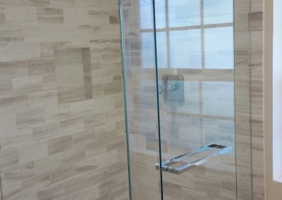 Earopean shower enclosure with polished nickel hardware
