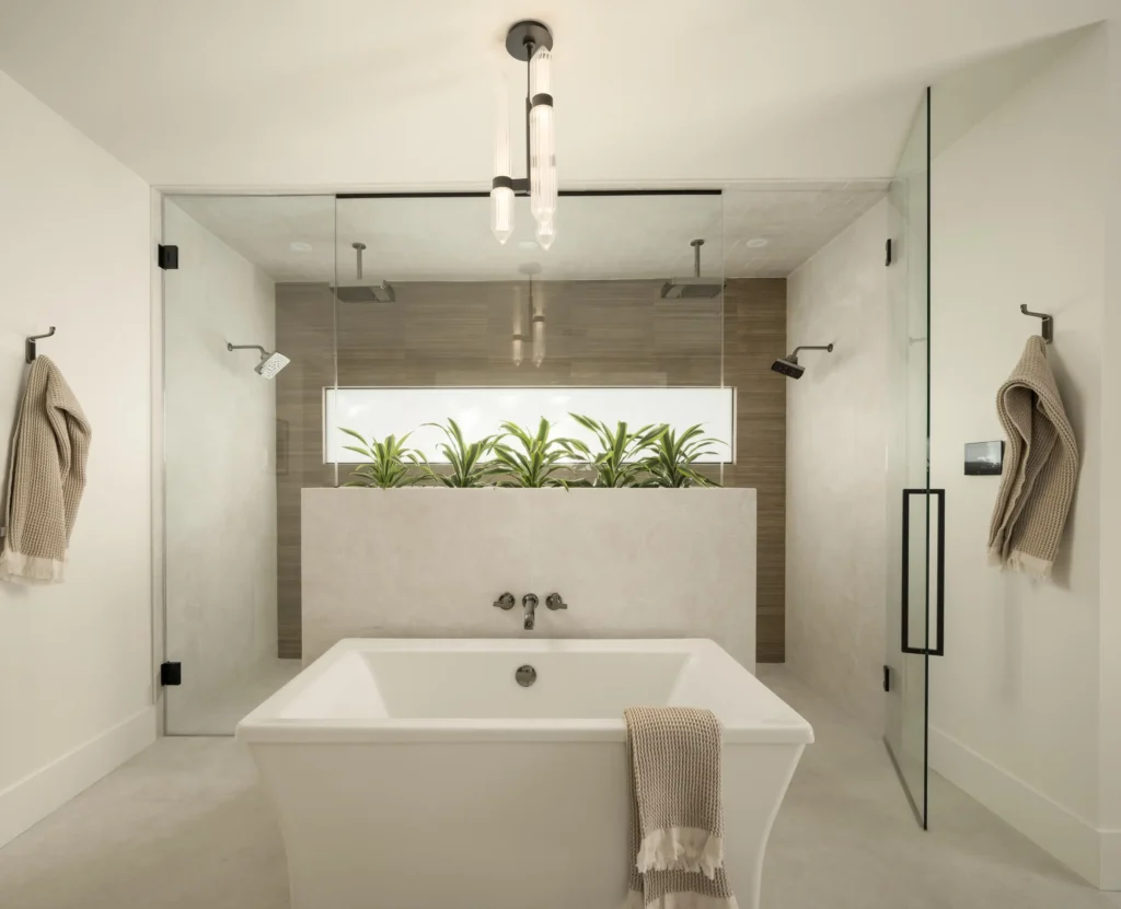 Double door steam shower with planter in the middle